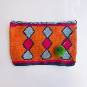 Handmade Armadillo Goes Green woven clutch bag